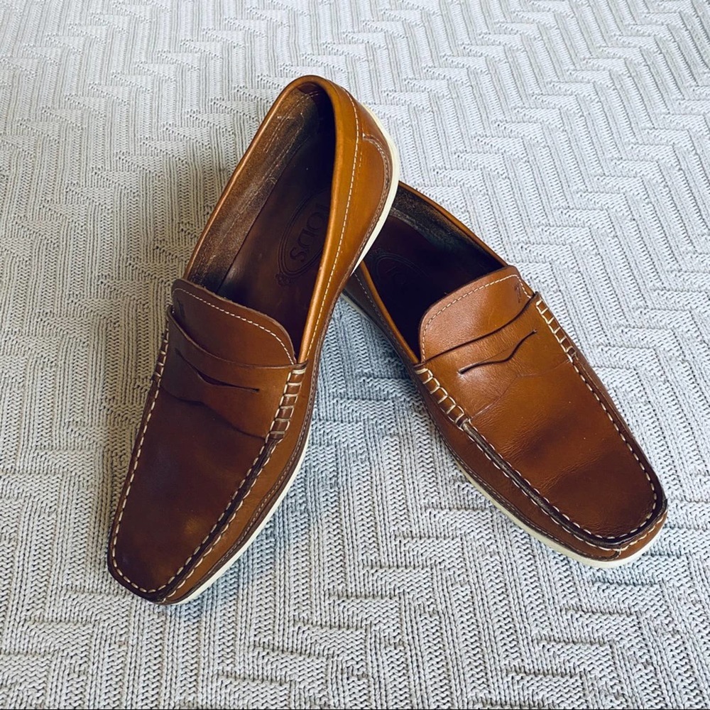 TOD’S brown leather penny loafers, size 7